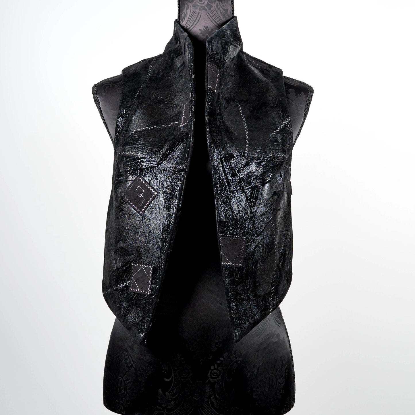 Black vest in faux leather and suede with over stitching and patches limited edition gothic style handmade in Melbourne Eloise the label