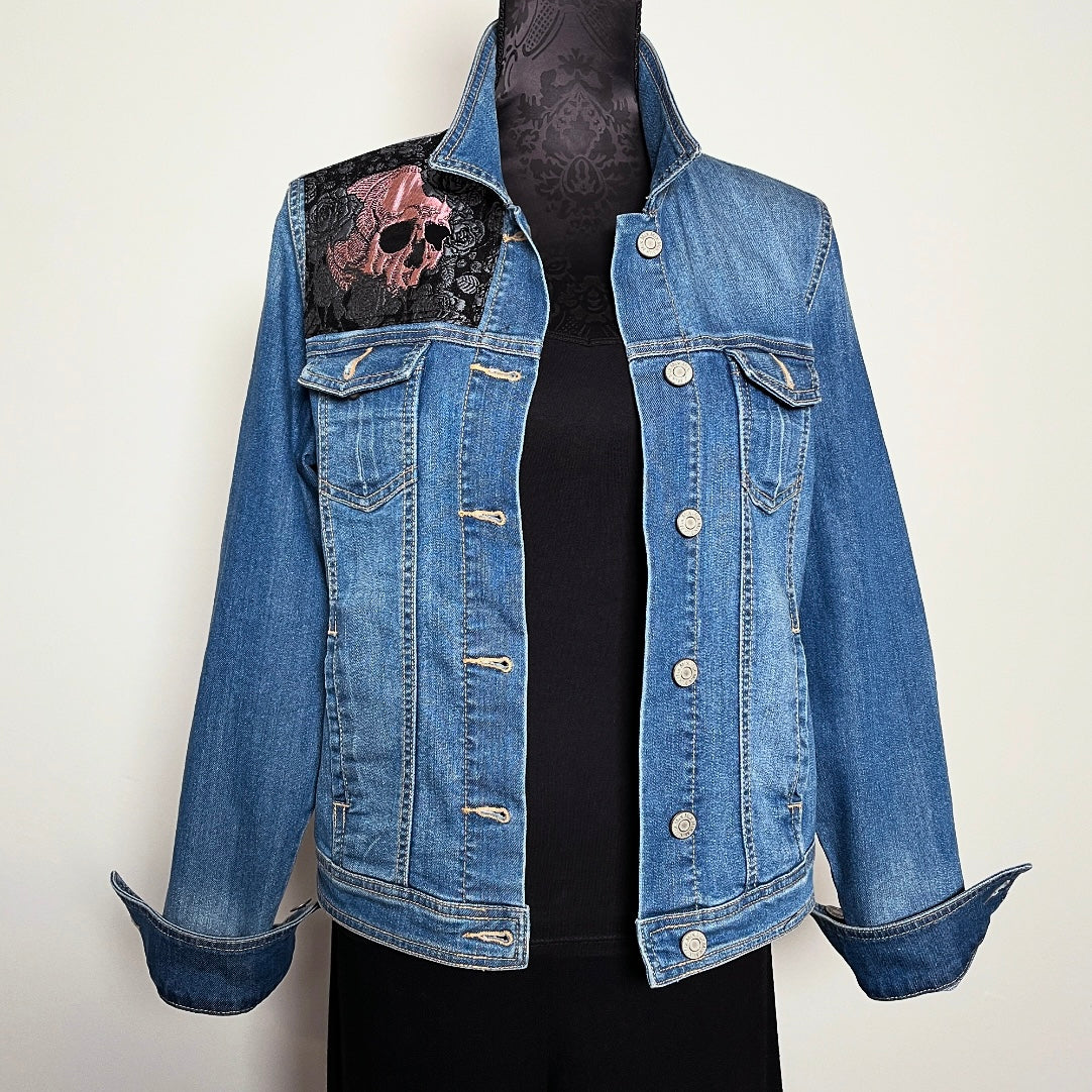 Upcycled blue denim jacket with skulls and roses in pink sustainable fashion melbourne made