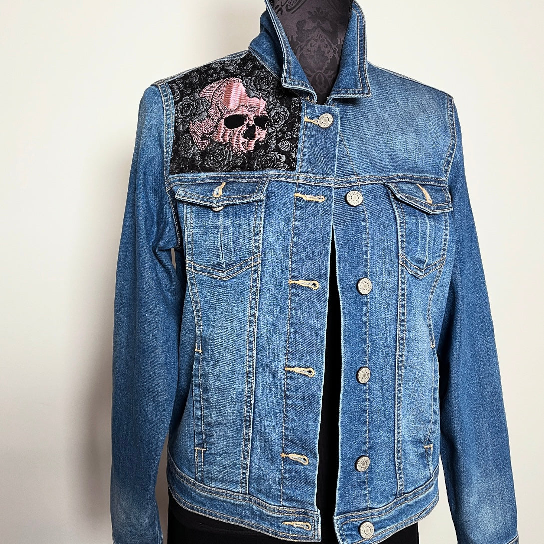 Upcycled blue denim jacket with skulls and roses in pink sustainable fashion melbourne made