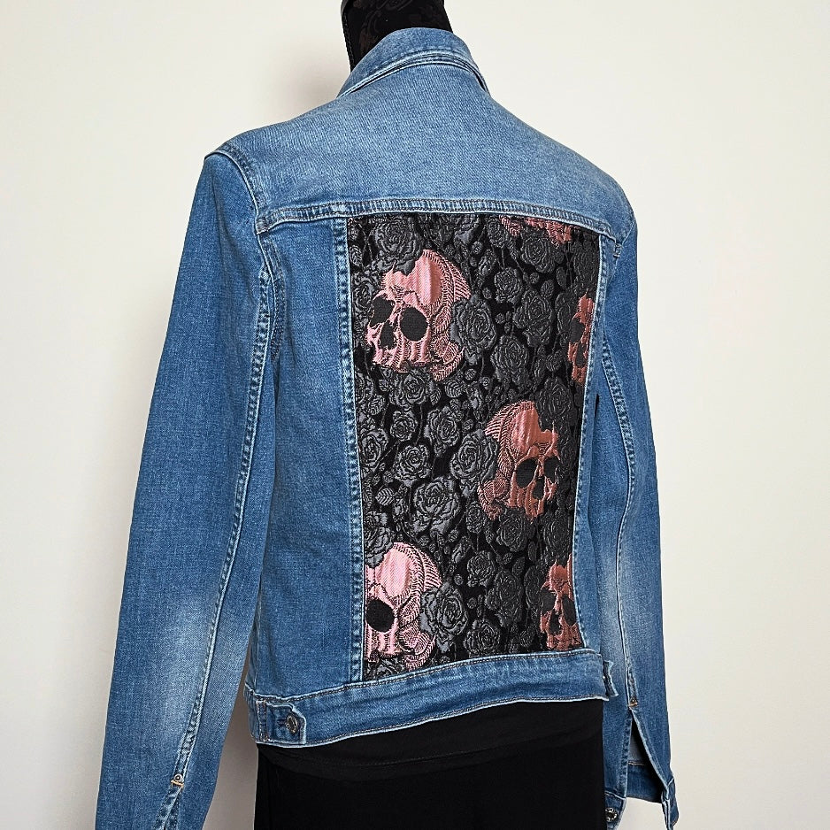 Upcycled blue denim jacket with skulls and roses in pink sustainable fashion melbourne made