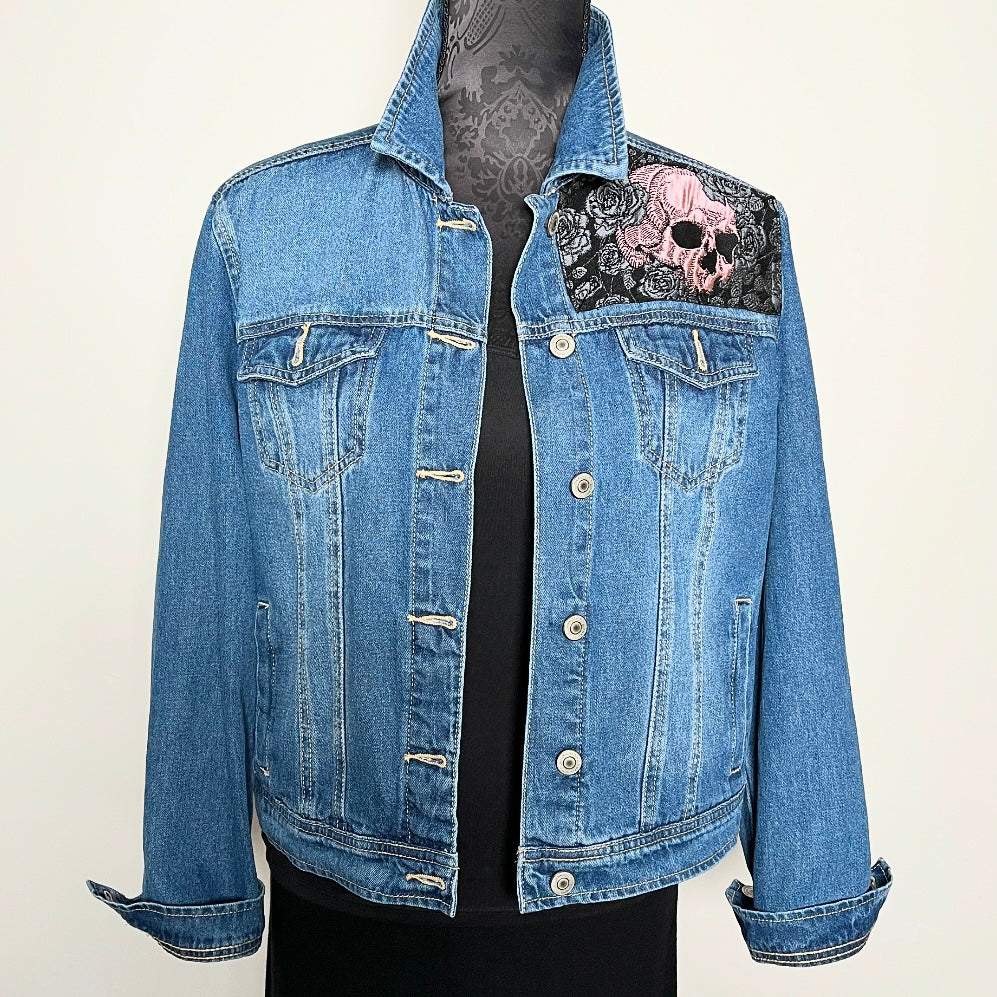 Upcycled blue denim jacket with skulls and roses in pink sustainable fashion melbourne made