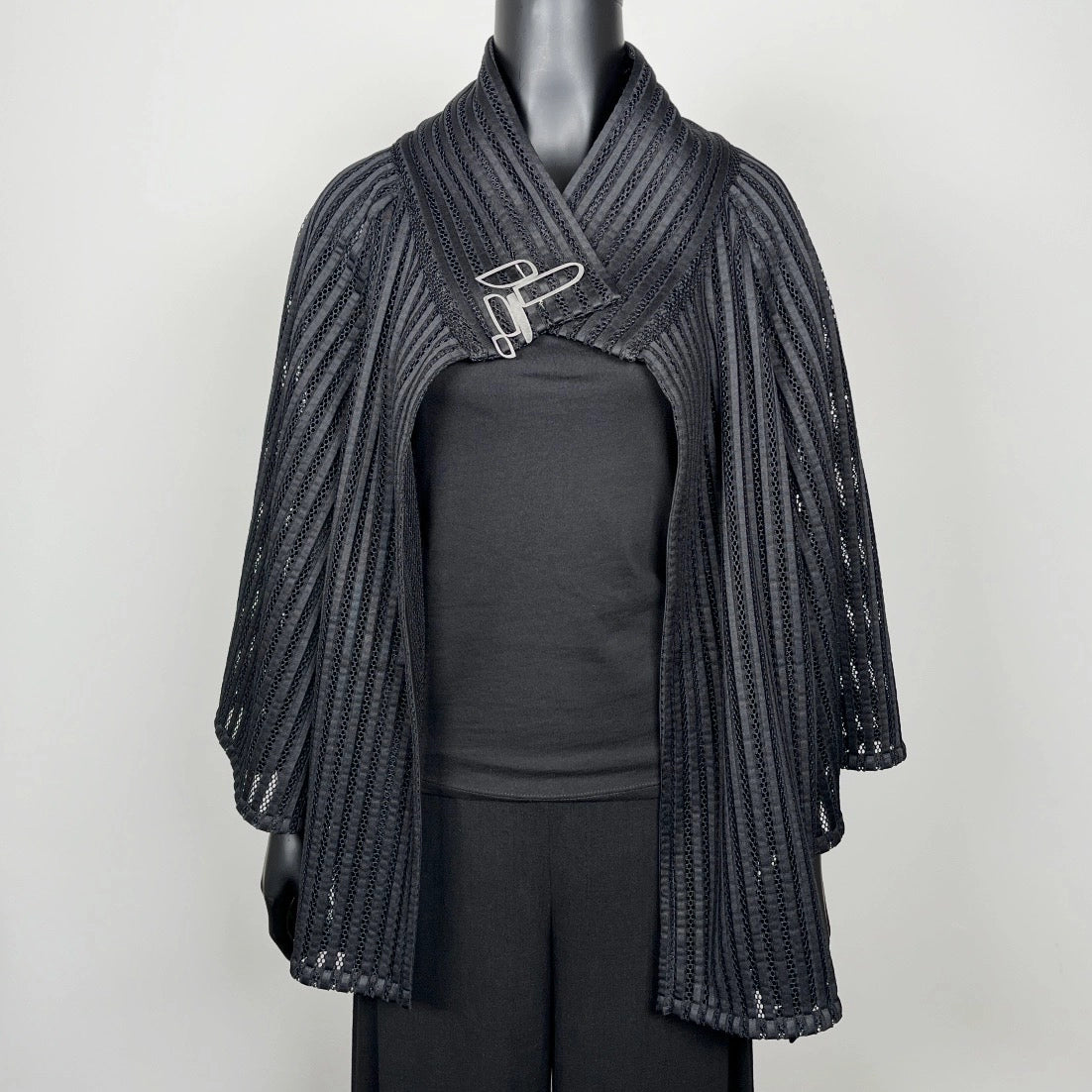 Black mesh coat with high stand up collar and statement silver brooch evening coat event wear unique clothing made in Melbourne Eloise the label