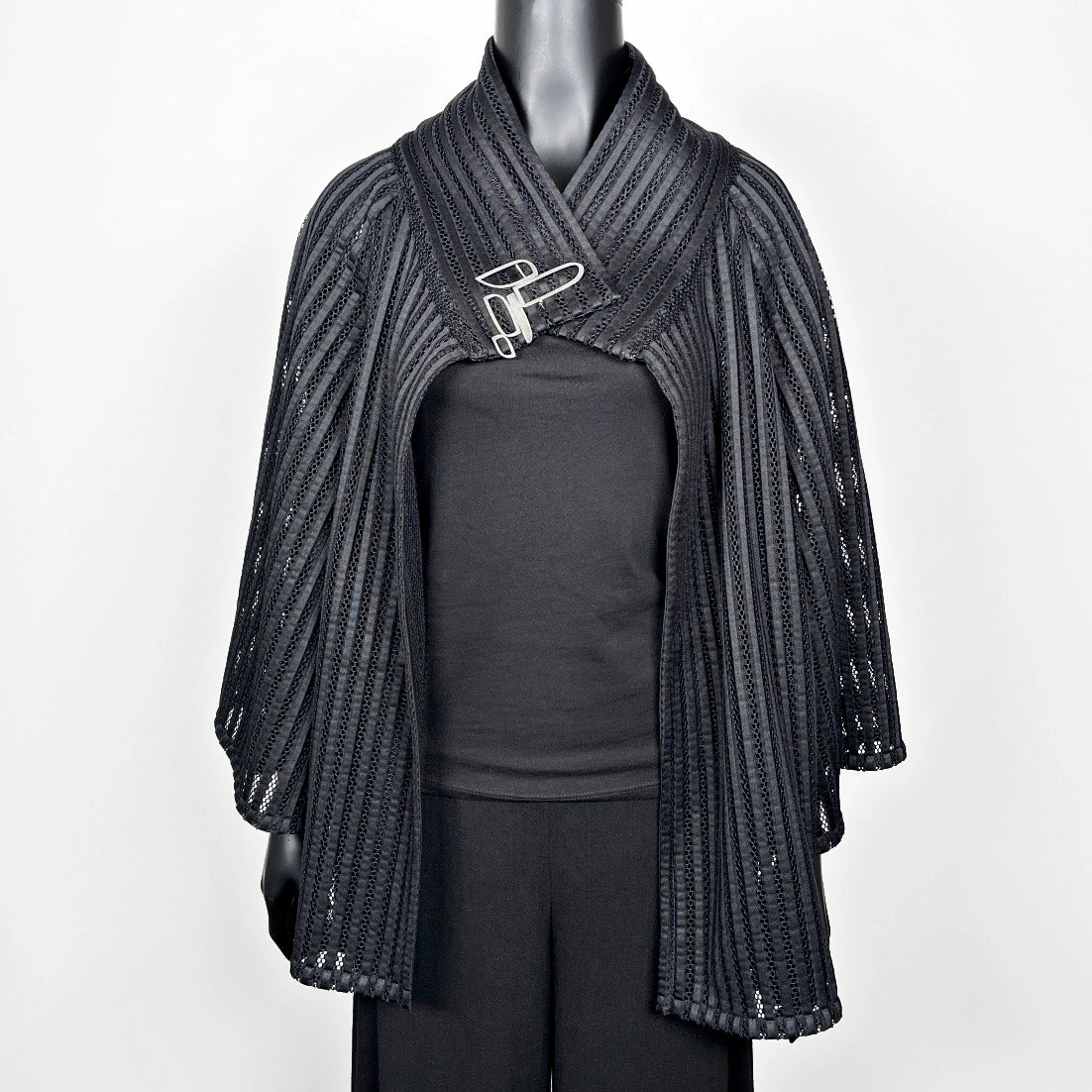 Black mesh coat with high stand up collar and statement silver brooch evening coat event wear unique clothing made in Melbourne Eloise the label