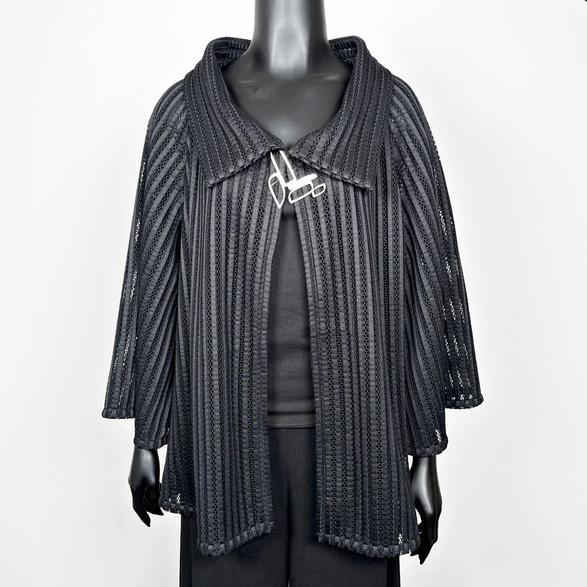Black mesh coat with high stand up collar and statement silver brooch evening coat event wear unique clothing made in Melbourne Eloise the label