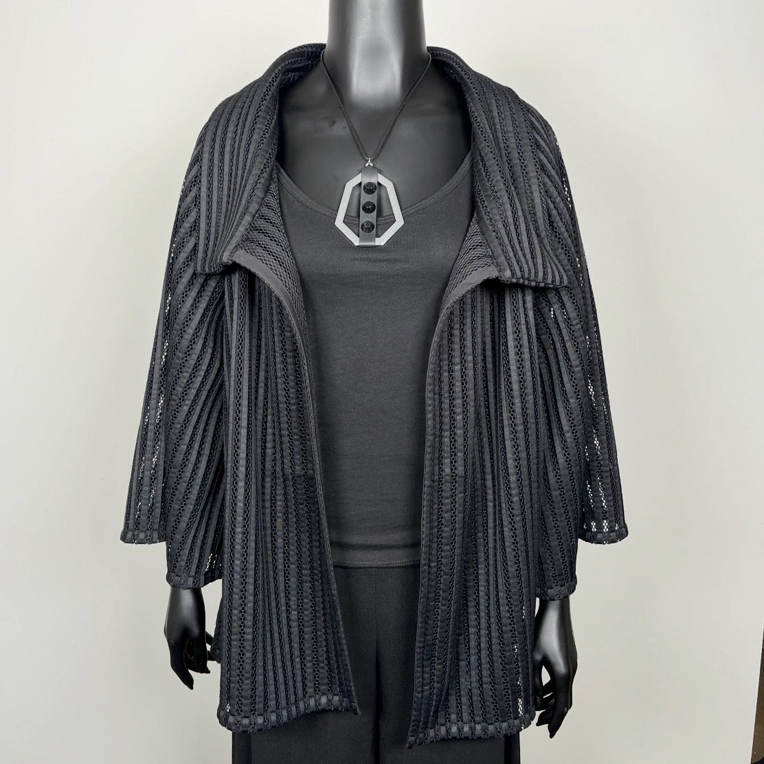 Black mesh coat with high stand up collar and statement silver brooch evening coat event wear unique clothing made in Melbourne Eloise the label