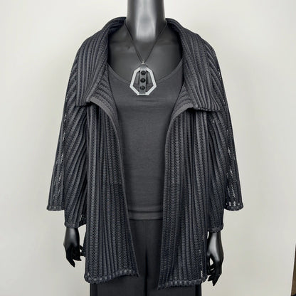 Black mesh coat with high stand up collar and statement silver brooch evening coat event wear unique clothing made in Melbourne Eloise the label