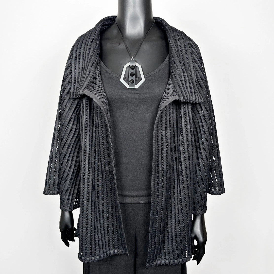 Black mesh coat with high stand up collar and statement silver brooch evening coat event wear unique clothing made in Melbourne Eloise the label