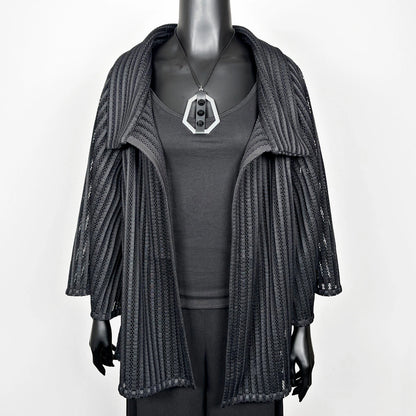 Black mesh coat with high stand up collar and statement silver brooch evening coat event wear unique clothing made in Melbourne Eloise the label