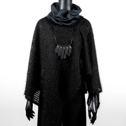 Black knit poncho with soft texture black velvet loop scarf and black rubber necklace made in Melbourne  Eloise the label Australian made 