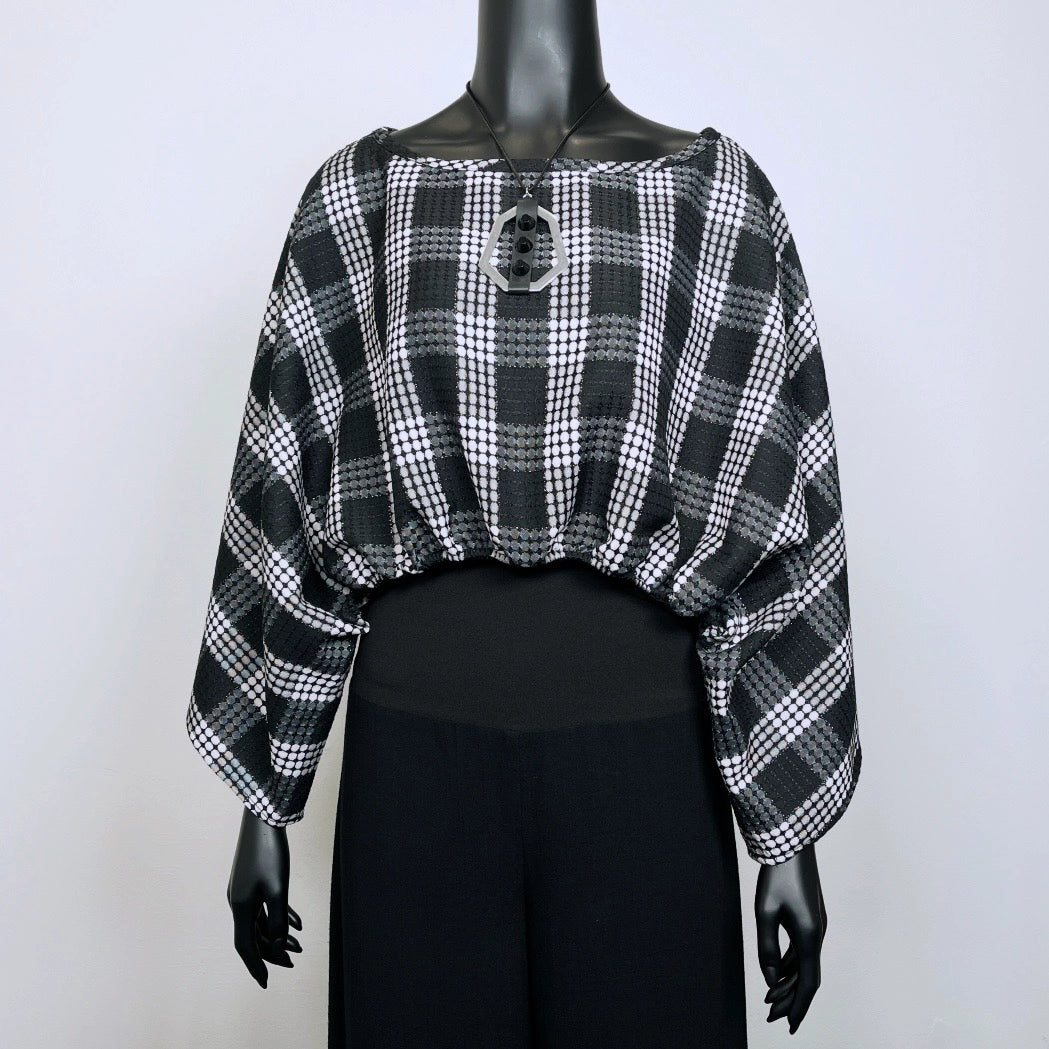 Black and white check layering top with bat wing sleeves and gathered waistline made in Melbourne