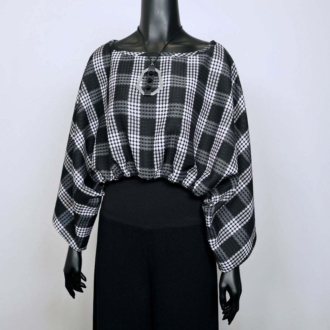 Black and white check layering top with bat wing sleeves and gathered waistline made in Melbourne