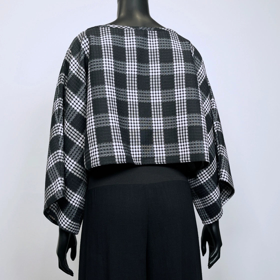 Black and white check layering top with bat wing sleeves and gathered waistline made in Melbourne