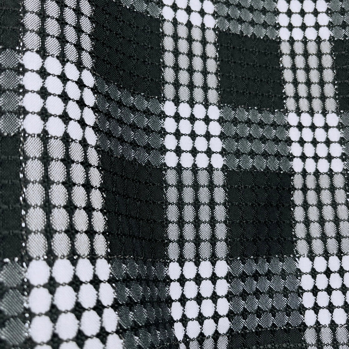 Black and white check layering top with bat wing sleeves and gathered waistline made in Melbourne