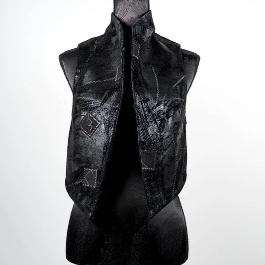 Black vest in faux leather and suede with over stitching and patches limited edition gothic style handmade in Melbourne Eloise the label