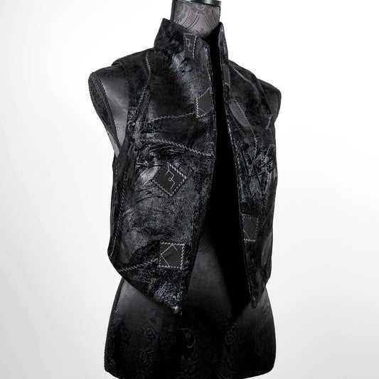 Black vest in faux leather and suede with over stitching and patches limited edition gothic style handmade in Melbourne Eloise the label