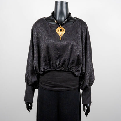 Black bonded lace jacquard top with batwing sleeves layering top gold cross necklace on black onyx beads made in Melbourne Eloise the label