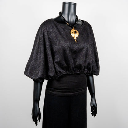 Black bonded lace jacquard top with batwing sleeves layering top gold cross necklace on black onyx beads made in Melbourne Eloise the label