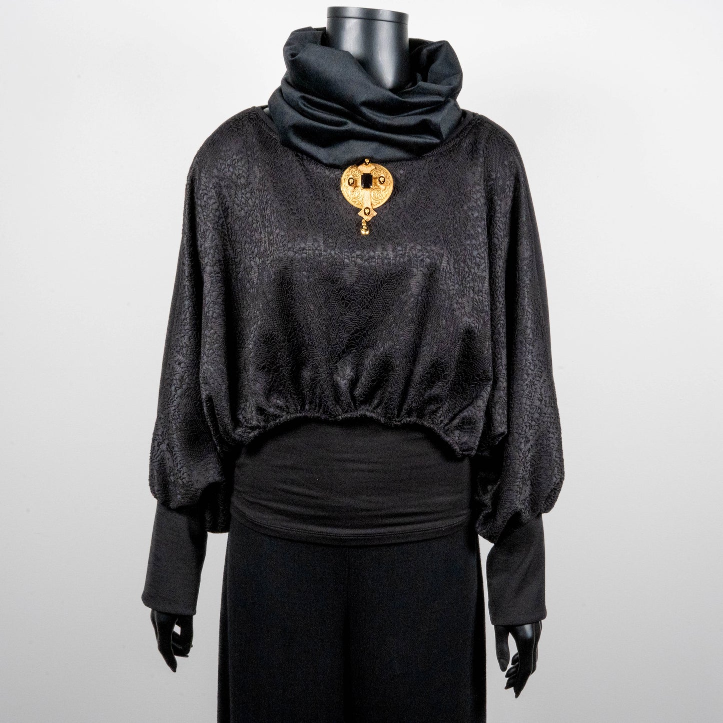 Black bonded lace jacquard top with batwing sleeves layering top gold cross necklace on black onyx beads black velevt loop scarf made in Melbourne Eloise the label