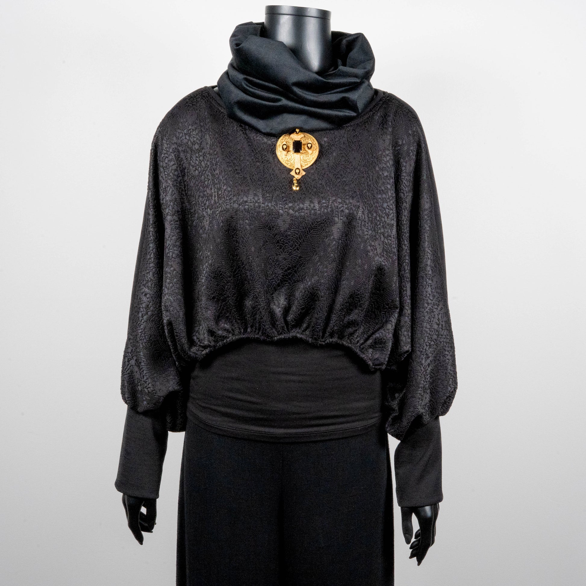 Black bonded lace jacquard top with batwing sleeves layering top gold cross necklace on black onyx beads black velevt loop scarf made in Melbourne Eloise the label