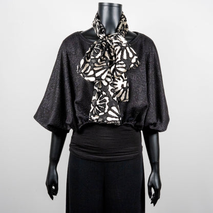 Black bonded lace jacquard top with batwing sleeves layering top gold cross necklace on black onyx beads black and white floral pussy bow made in Melbourne Eloise the label 