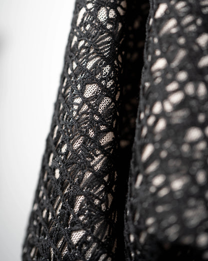 Black mesh jacquard top with bat wing sleeves and gathered hemline black rubber necklace made in Melbourne Eloise the label