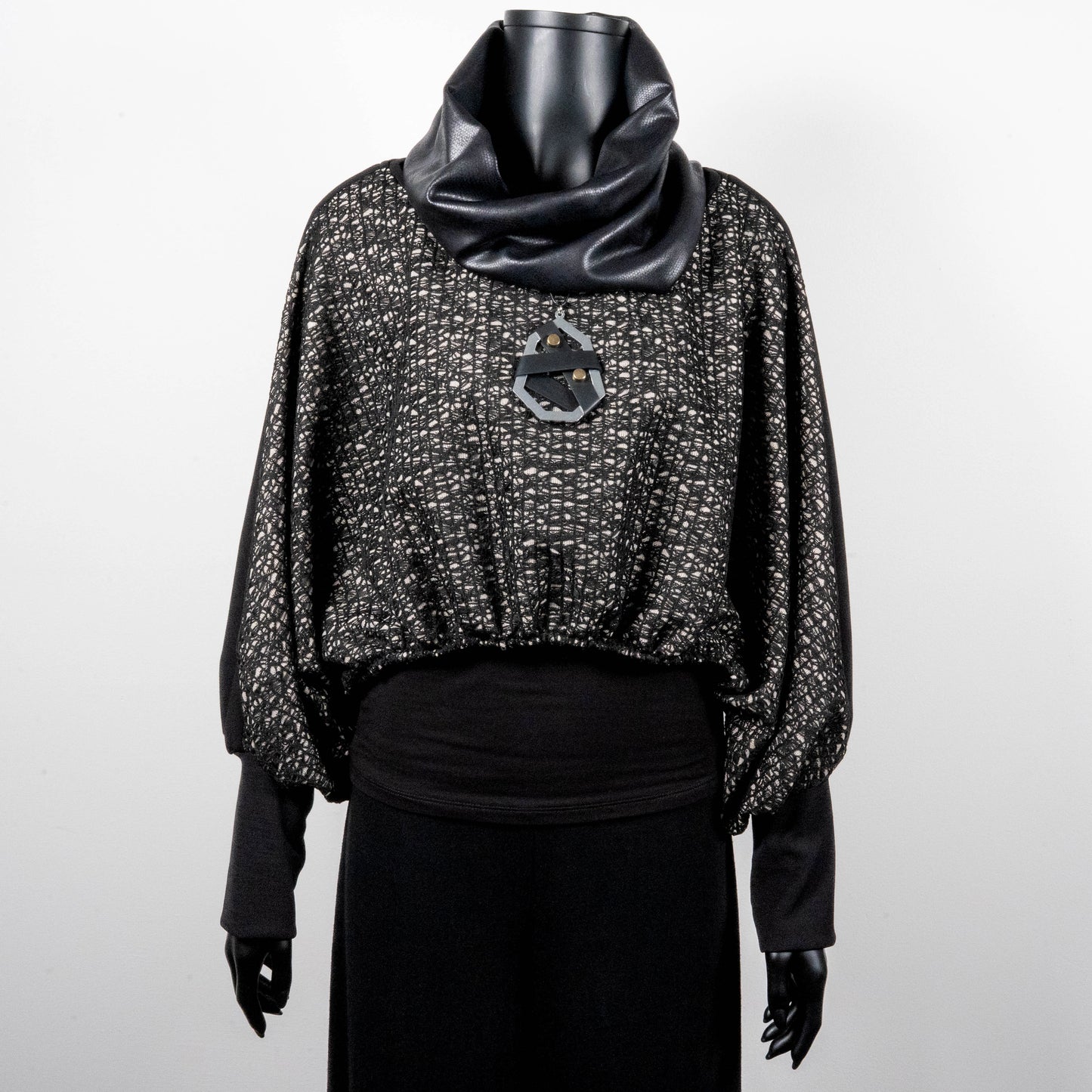 Black mesh jacquard top with bat wing sleeves and gathered hemline black rubber necklace faux leather loop scarf made in Melbourne Eloise the label