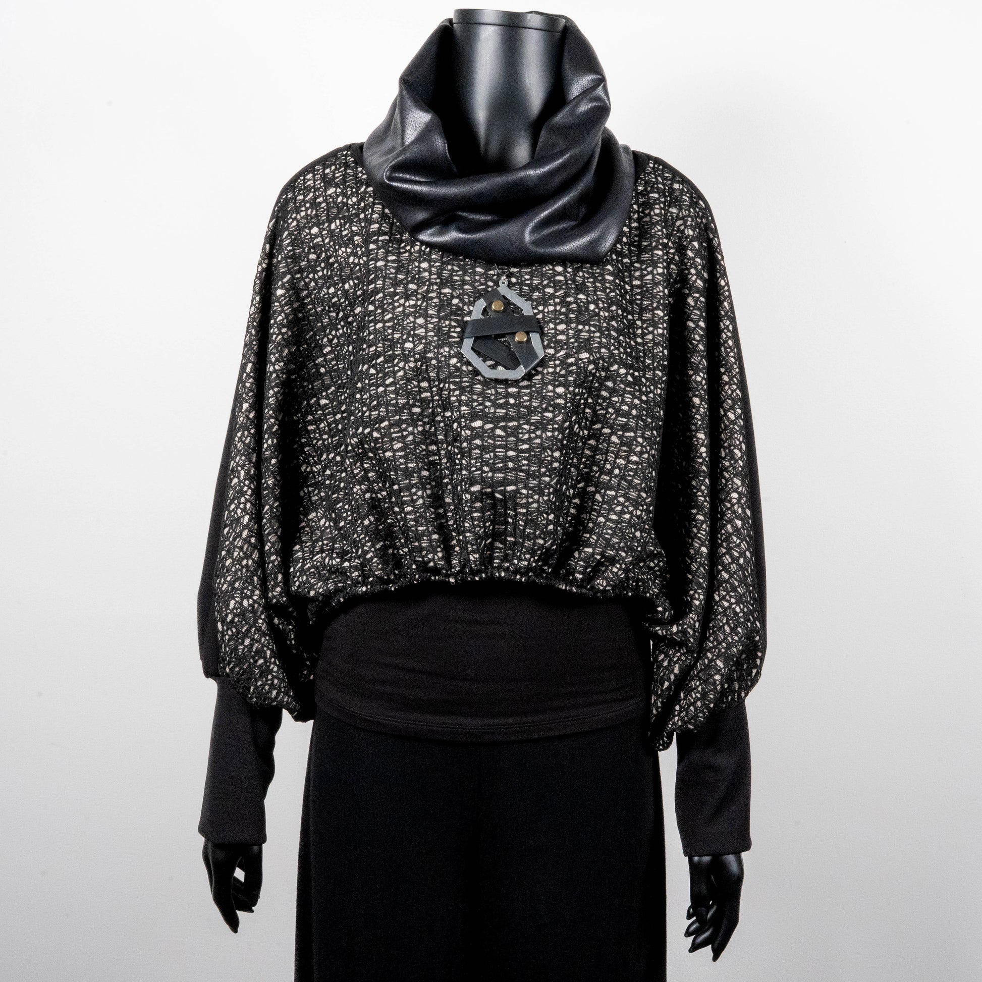 Black mesh jacquard top with bat wing sleeves and gathered hemline black rubber necklace faux leather loop scarf made in Melbourne Eloise the label