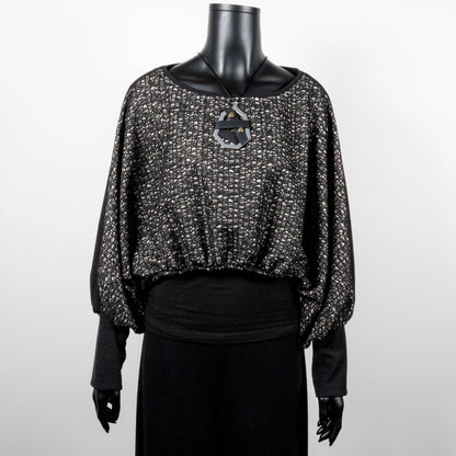 Black mesh jacquard top with bat wing sleeves and gathered hemline black rubber necklace made in Melbourne Eloise the label