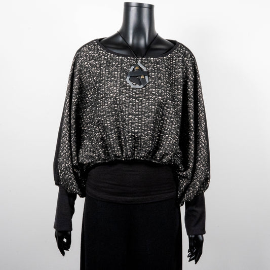 Black mesh jacquard top with bat wing sleeves and gathered hemline black rubber necklace made in Melbourne Eloise the label