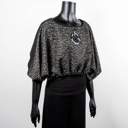 Black mesh jacquard top with bat wing sleeves and gathered hemline black rubber necklace made in Melbourne Eloise the label