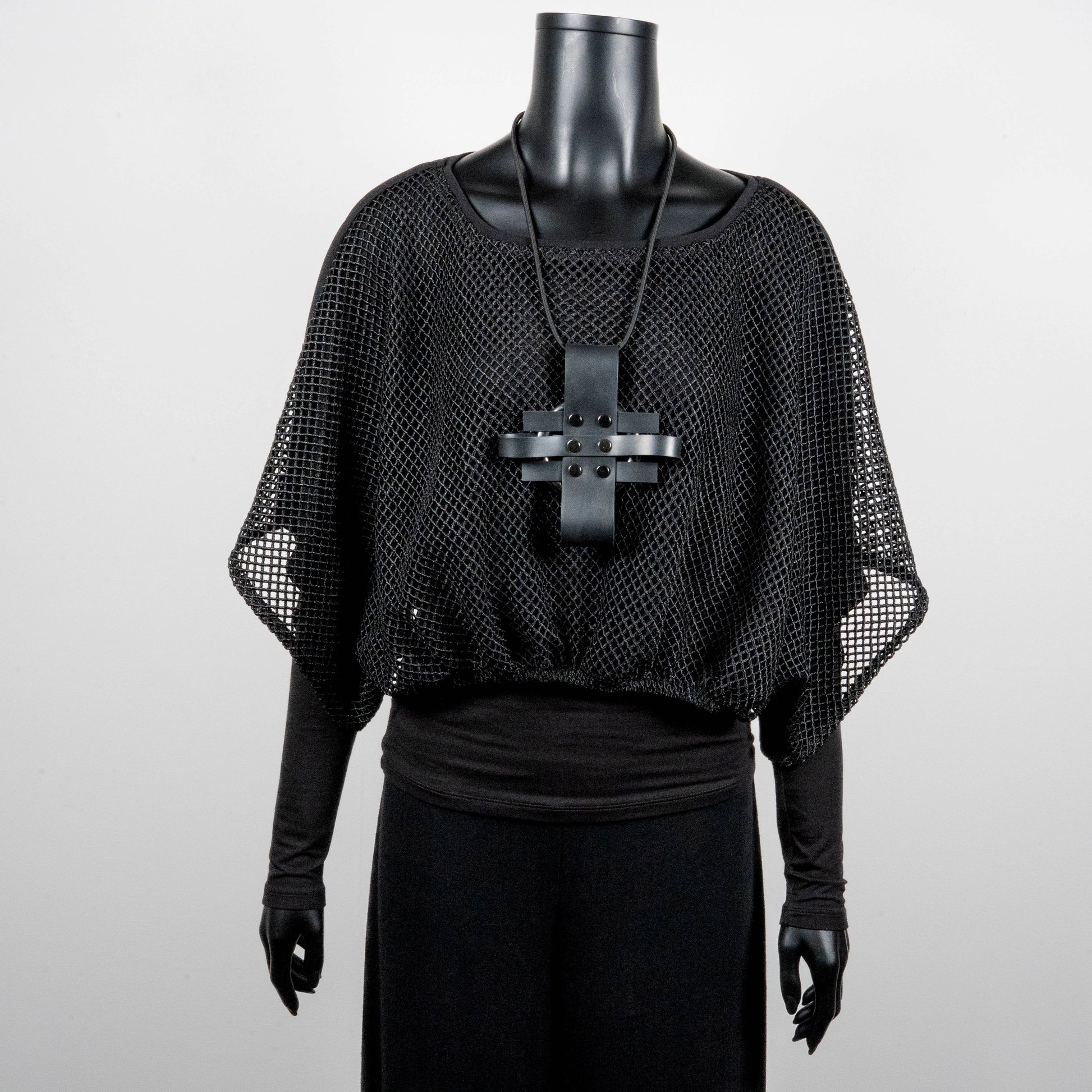 Black mesh top with bat wing sleeves and gathered hemline black rubber cross necklace made in Melbourne Eloise the label
